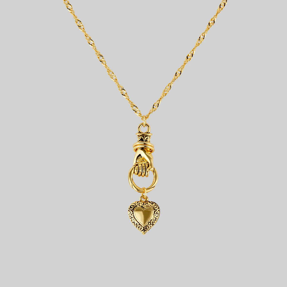 ALL OF ME. Hand Grasping Heart Necklace - Gold