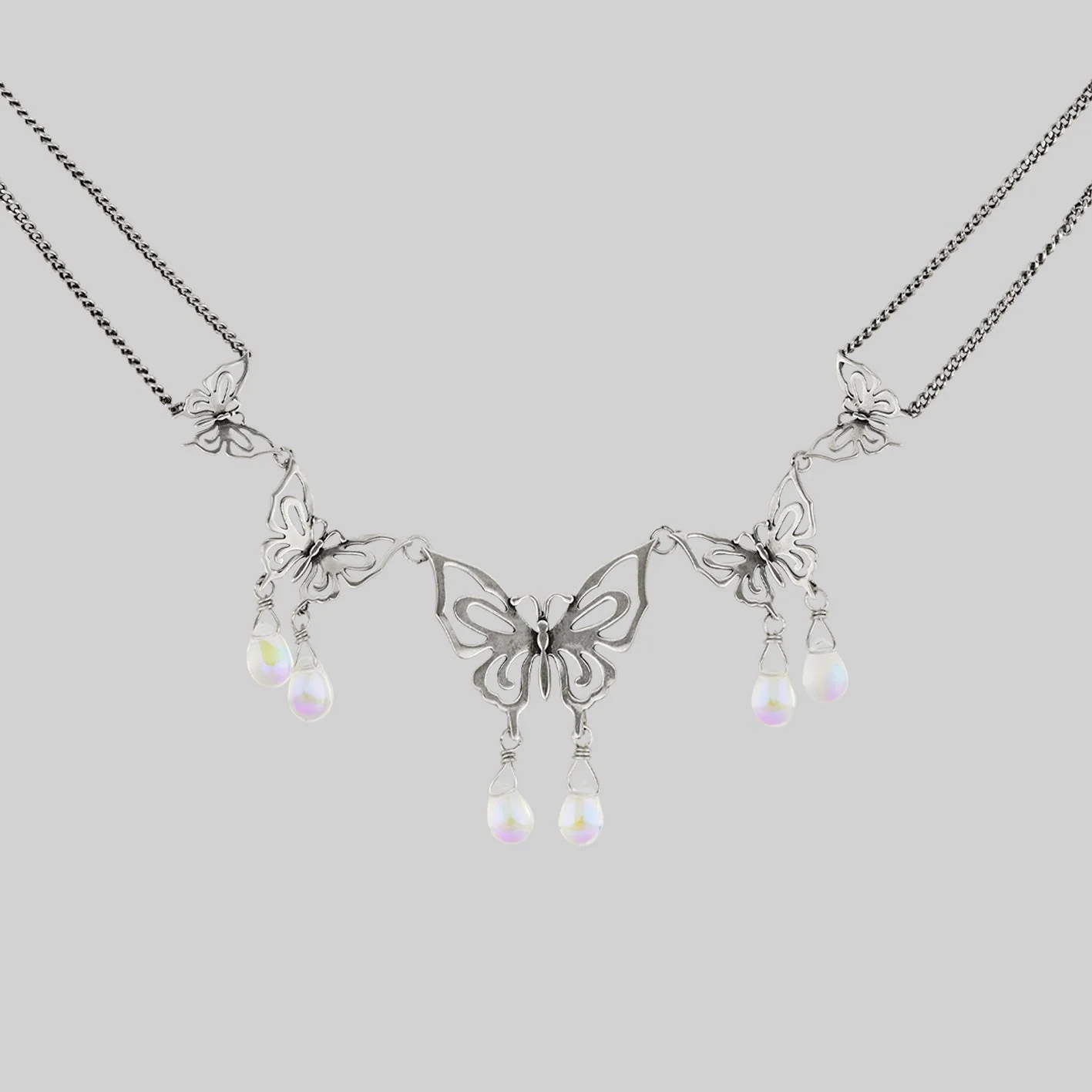 ANTHEIA. Iridescent Butterfly Droplet Necklace - Silver - Image 2
