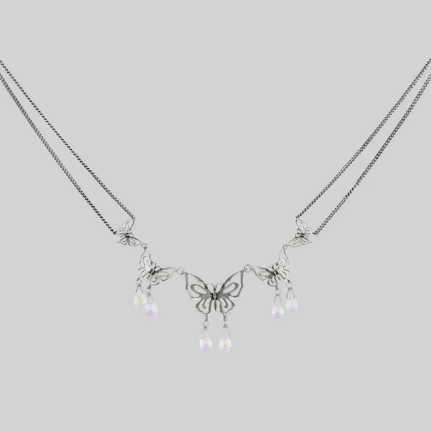 ANTHEIA. Iridescent Butterfly Droplet Necklace - Silver - Image 3