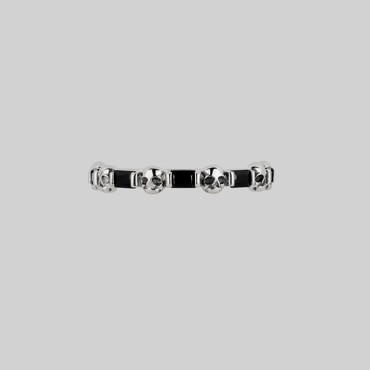 BEAUX. Tiny Skull & Black Spinel Band Ring - Silver