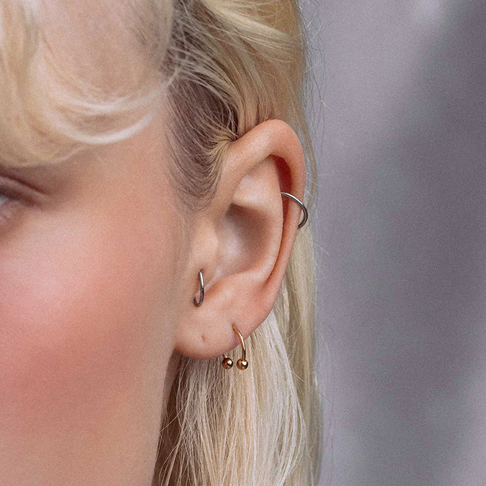 CLEO. Circular Titanium Barbell Ring - Gold - Image 4
