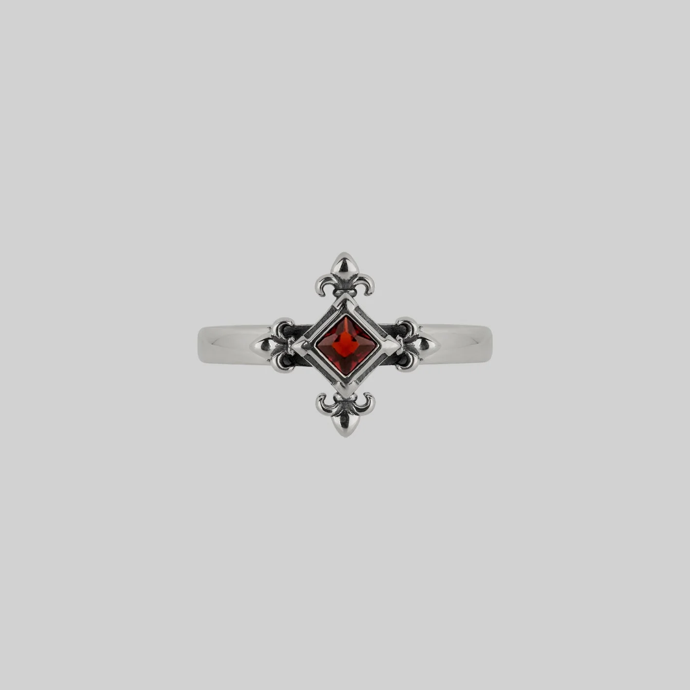 CRIMSON. Medieval Fleur de Lis Garnet Ring - Silver